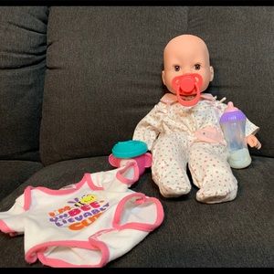 Sweet Target baby w/ onesie, pacifier & more